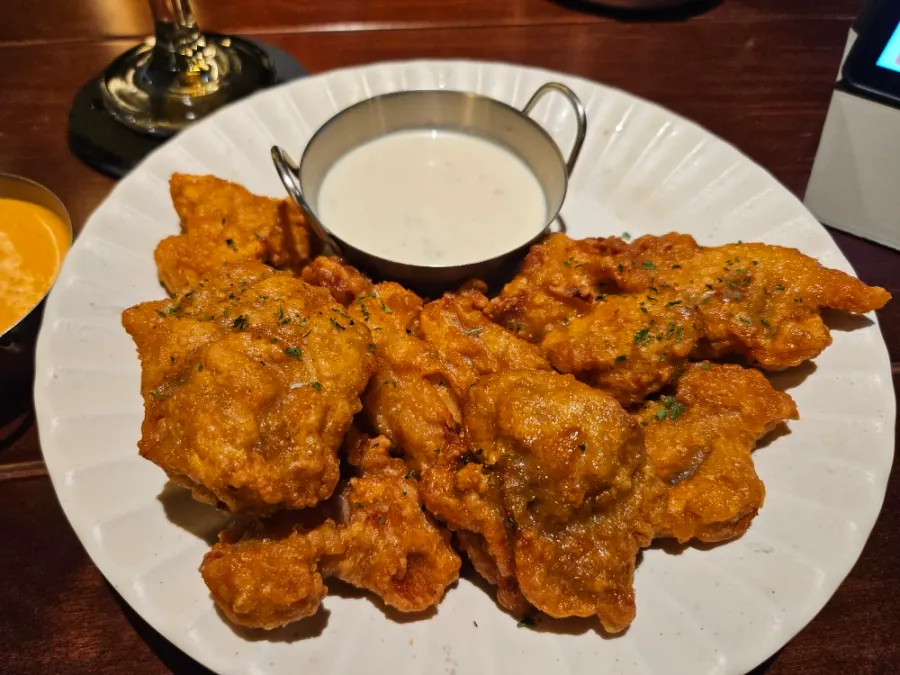 Order of draft beer and tulip fried chicken