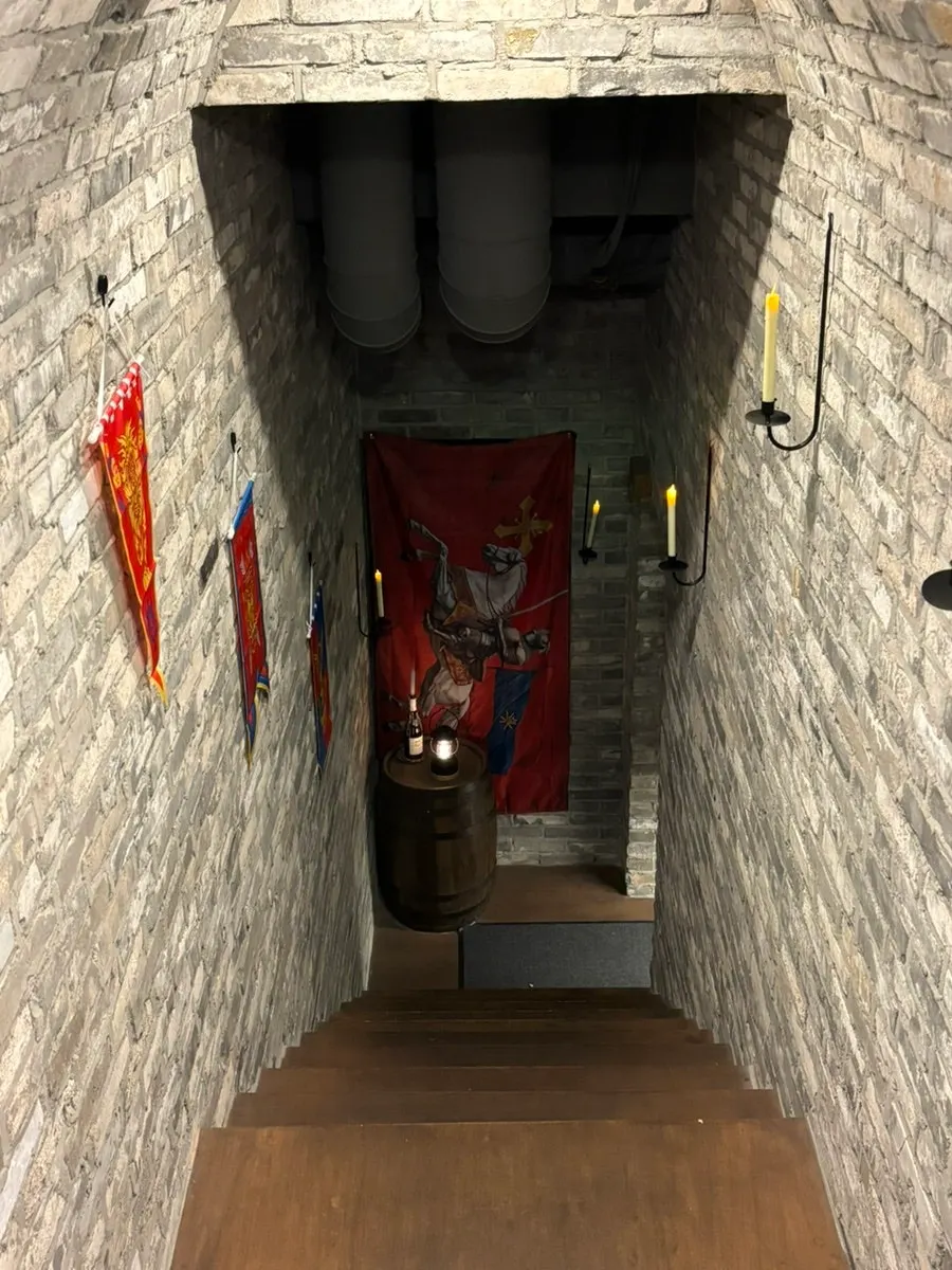 Stairway leading down to the basement level entrance