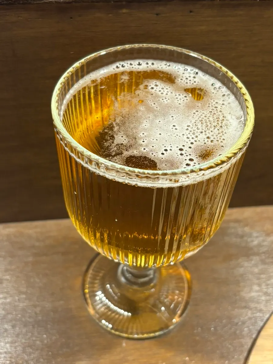 A glass of non-alcoholic Cass Zero Lemon