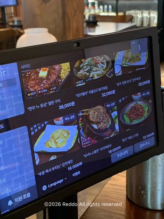 New Korean beef sirloin steak on a hot plate