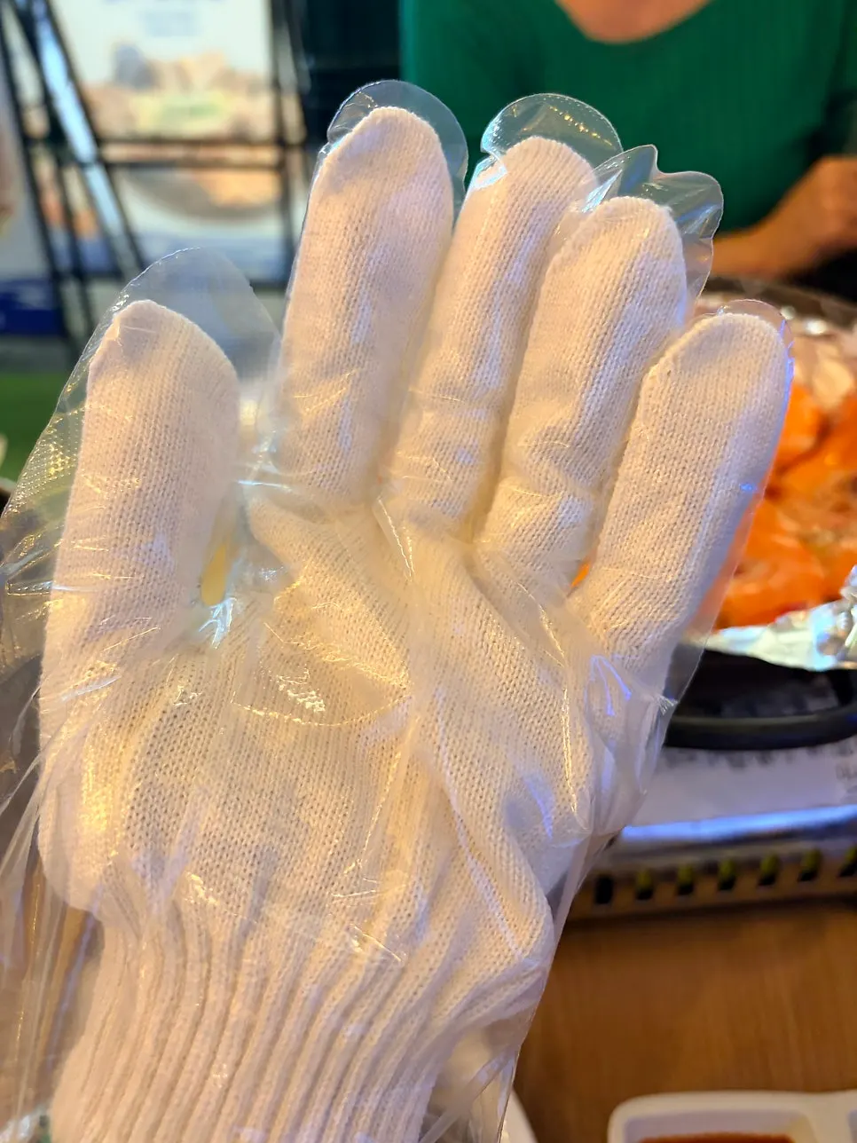 Prepping shrimp while wearing cotton gloves