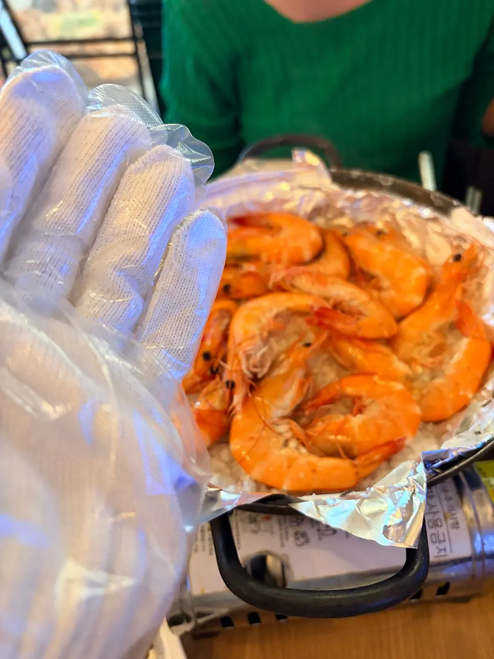 Jumbo shrimp meat held in hand