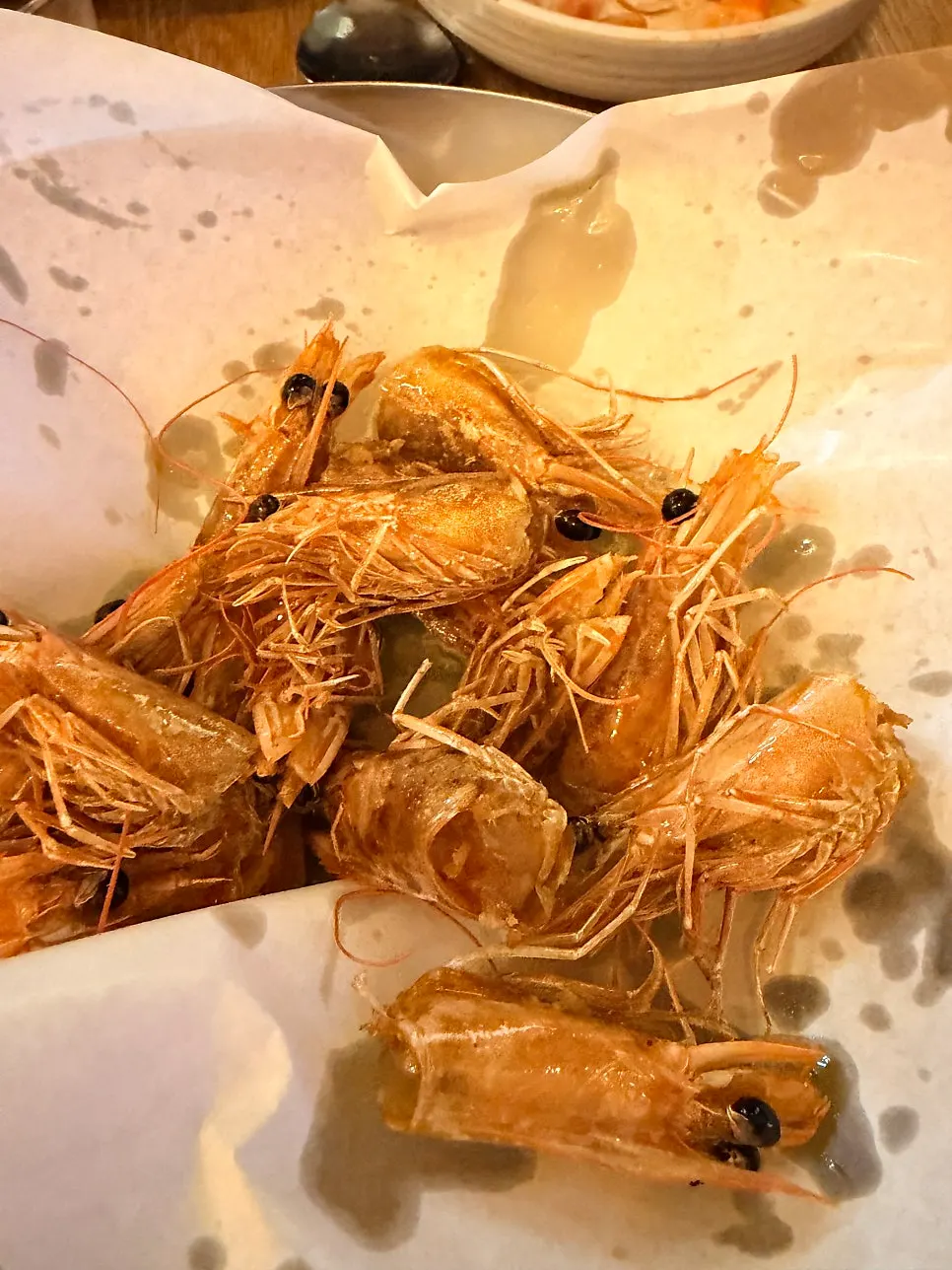 Fried shrimp heads served on a plate