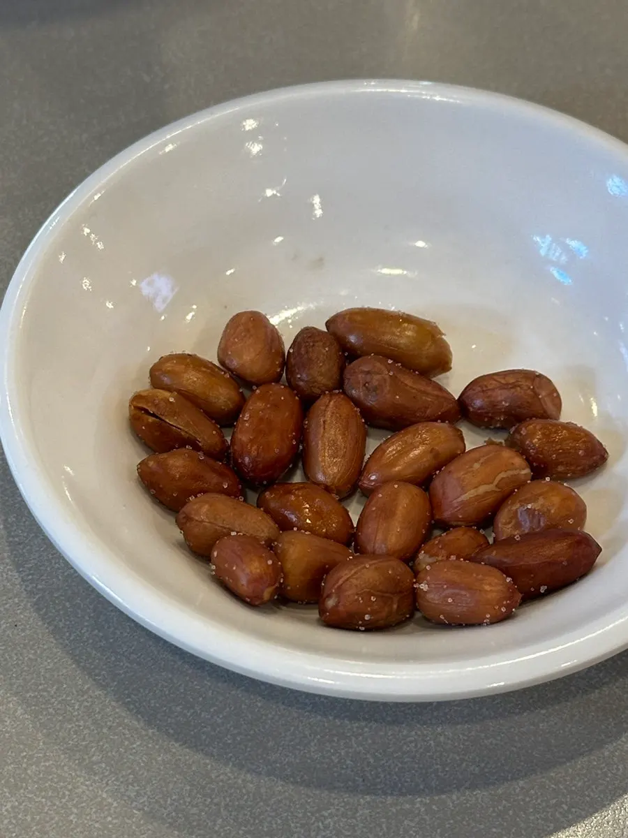 Two basic banchan: fried peanuts and pickled napa cabbage