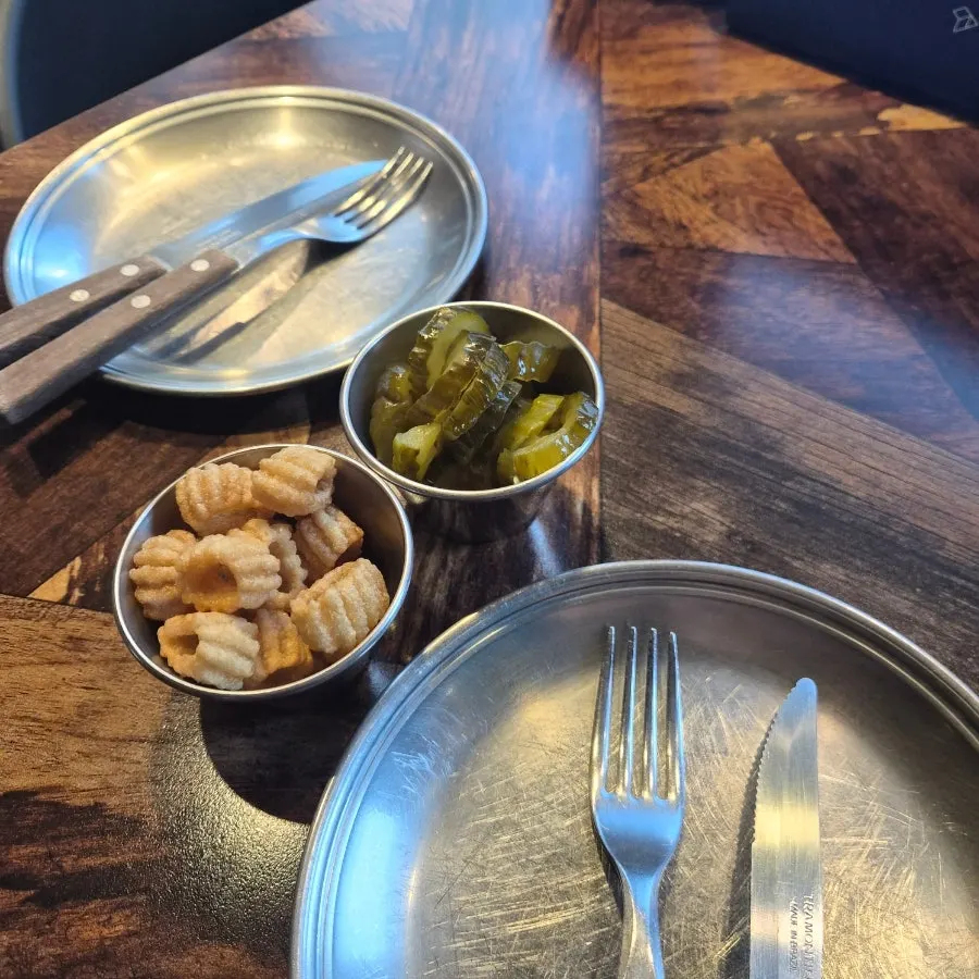 Pickles and Jjanggu snacks served as the basic setting
