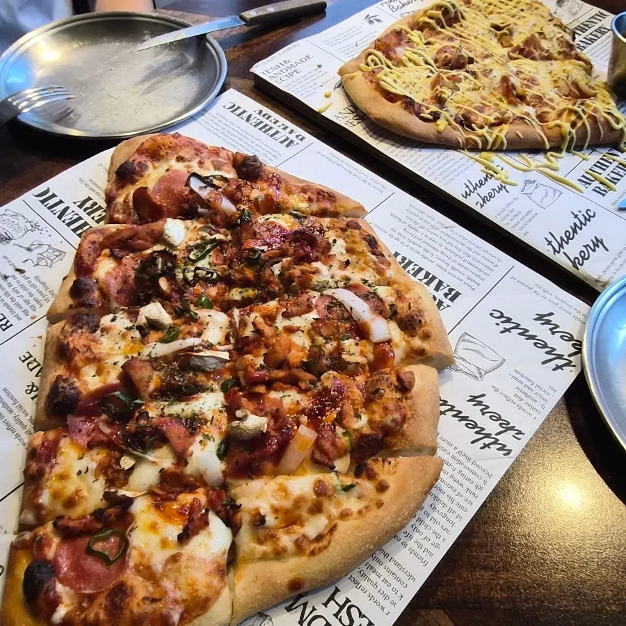 Didi's Fire Chicken Pizza topped with spicy sauce and chicken