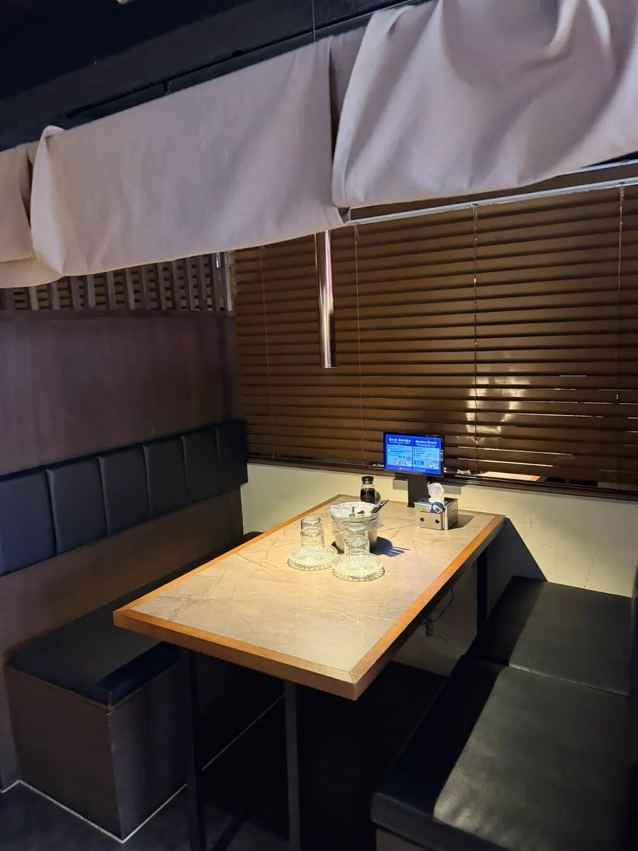 Aging refrigerator and fish tank inside the restaurant