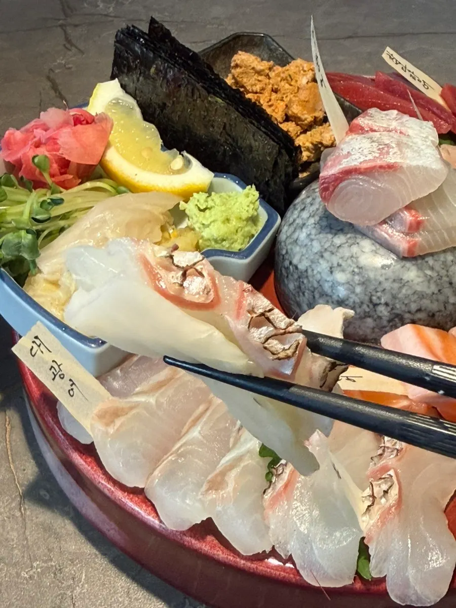 Small aged sashimi platter for two, arranged by fish type