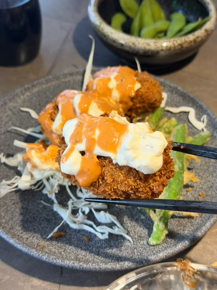 Plate of the hidden-menu snow crab innard cream croquette