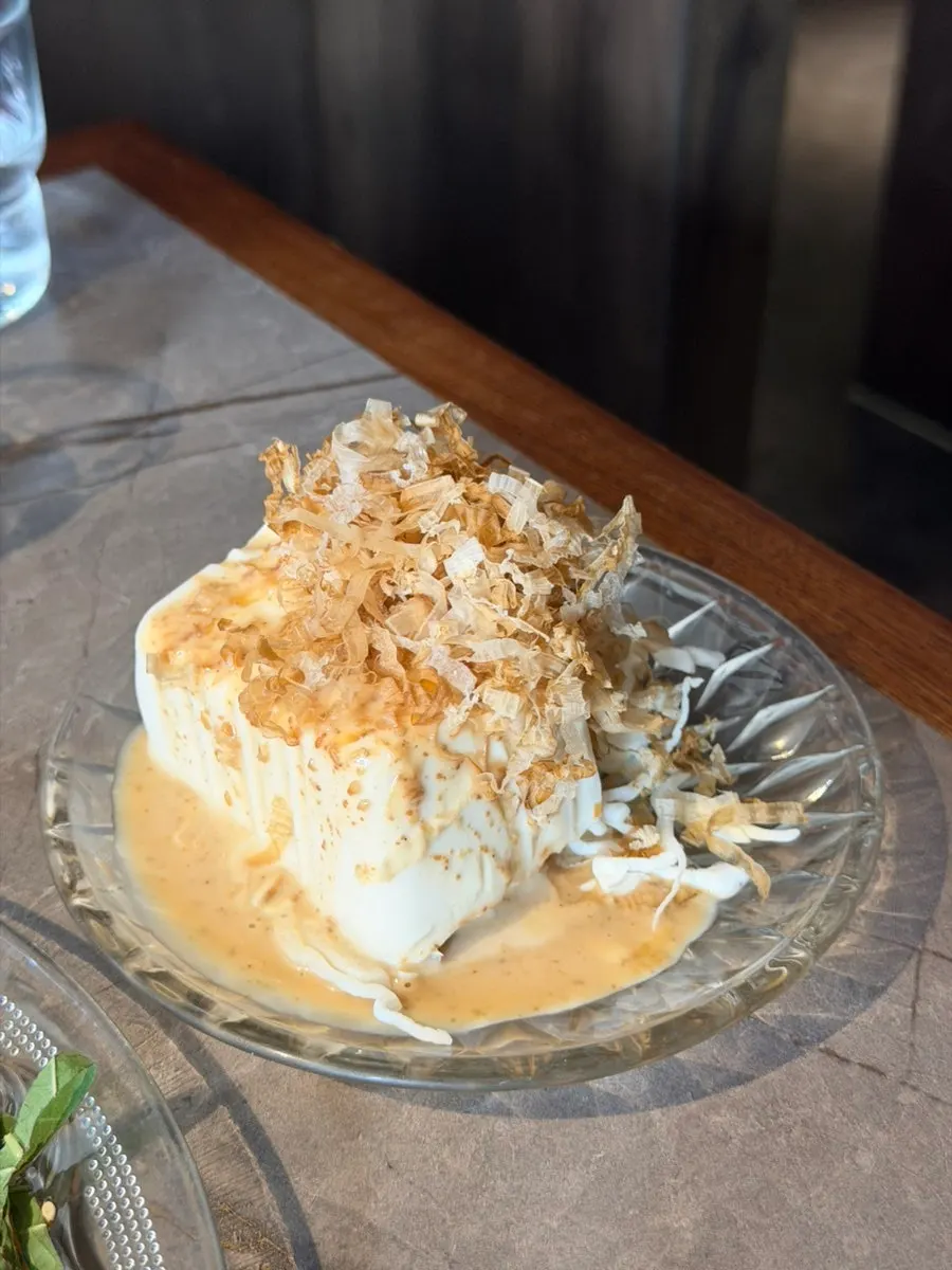 Extra soft tofu given as a complimentary side dish