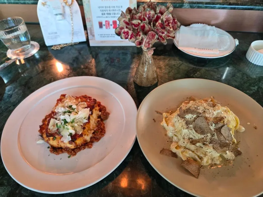 Ragù lasagna and truffle cheese-wheel tagliatelle