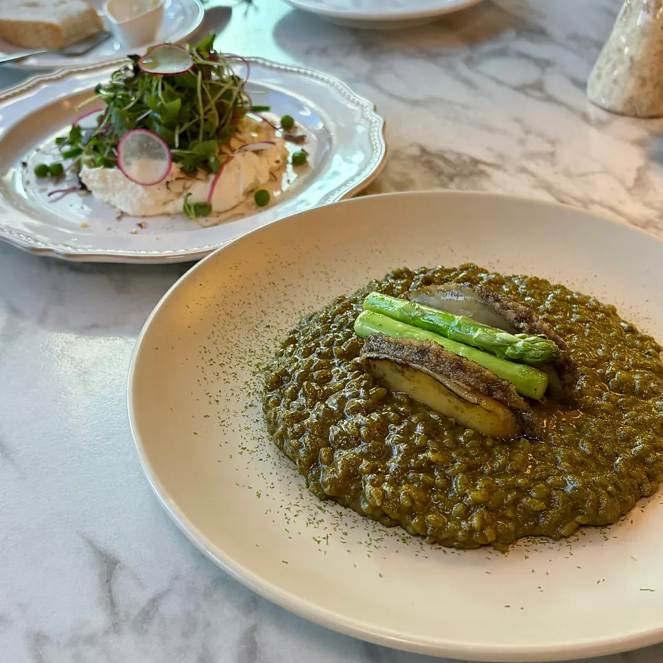 Wando abalone risotto with a whole abalone on top