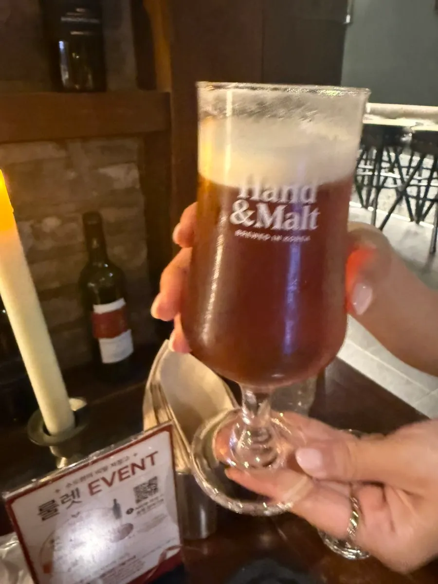 Two glasses of draft beer on the table