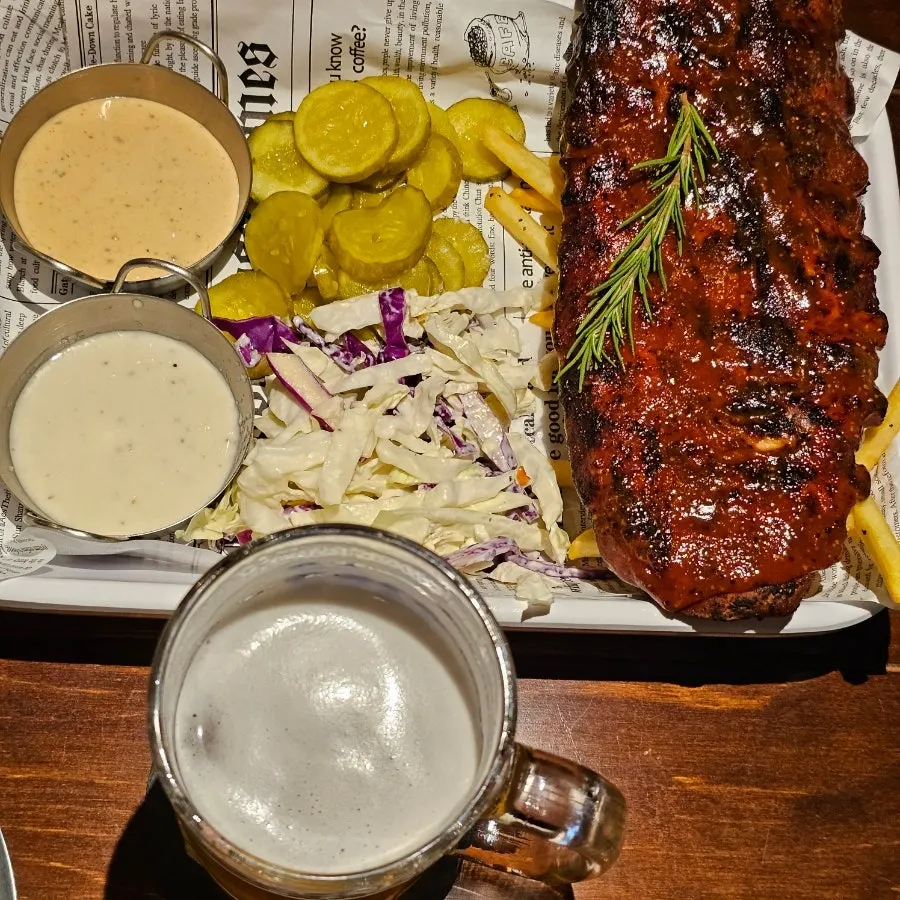 Confession-approved pork ribs served with fries