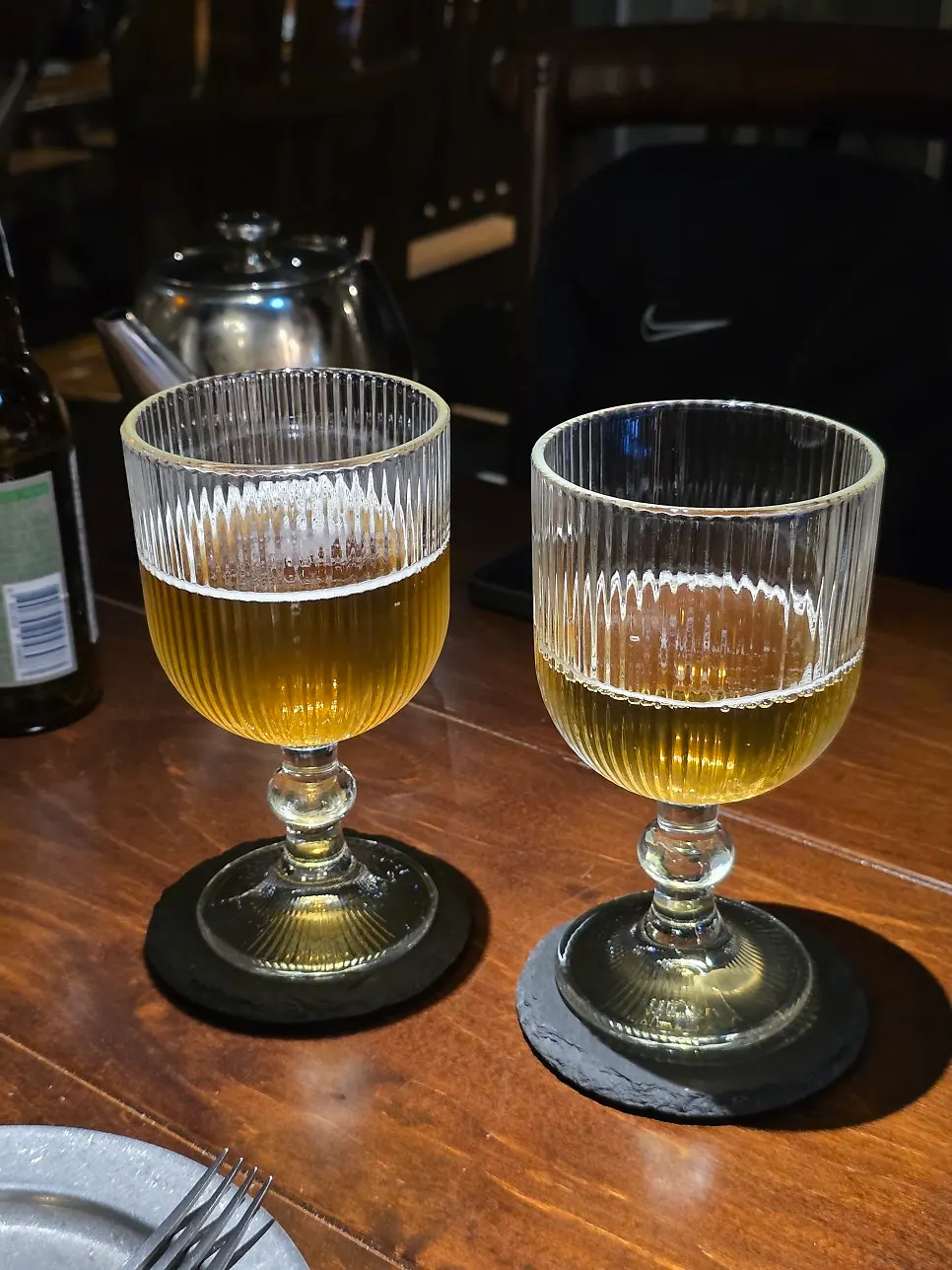 A glass of Cass lemon beer that was ordered