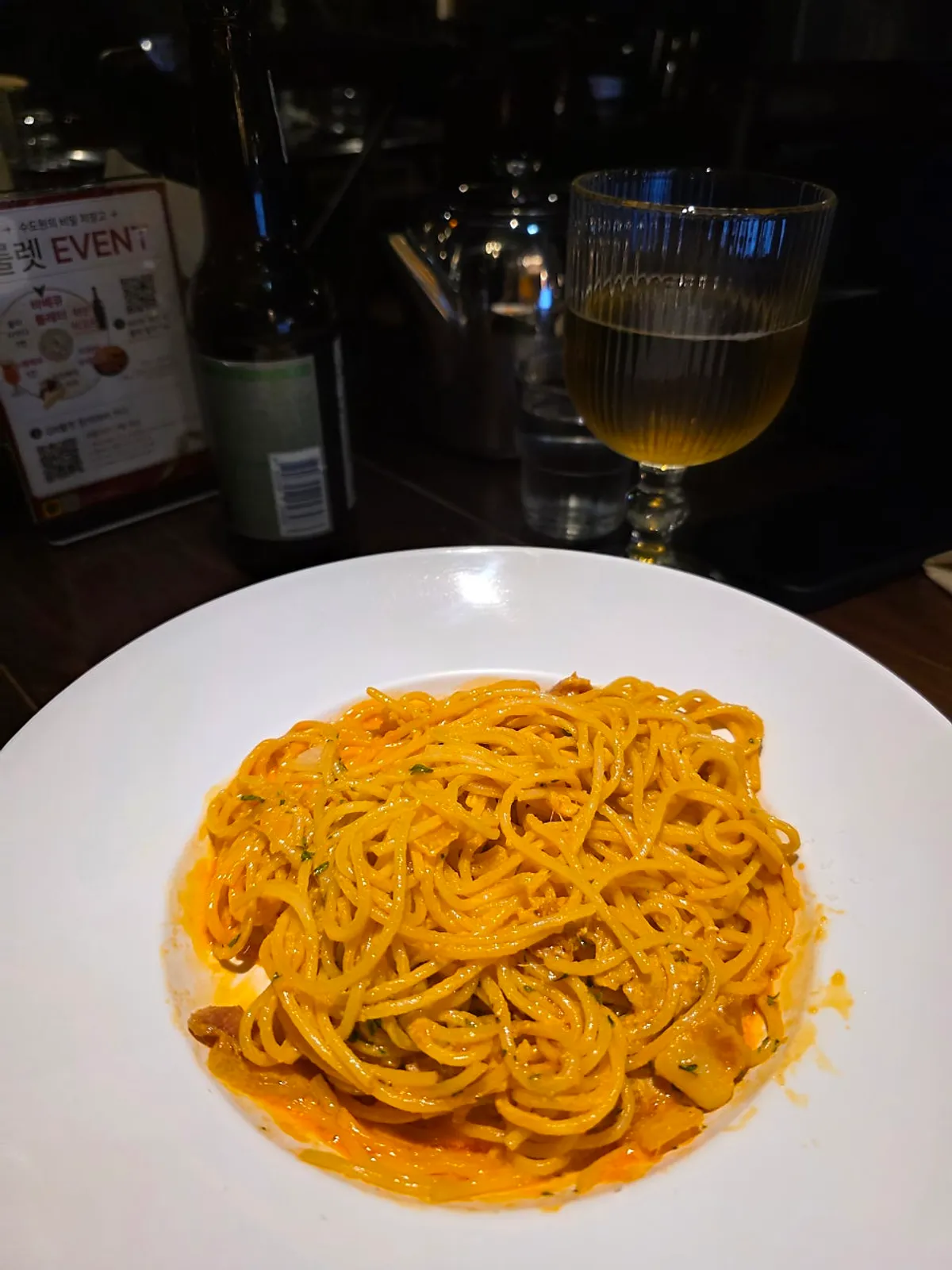 Silent rosé pasta being tossed together