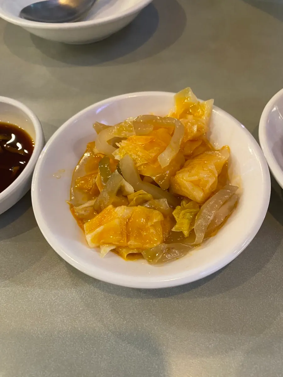 Knife-cut noodles shaved from dough with a blade