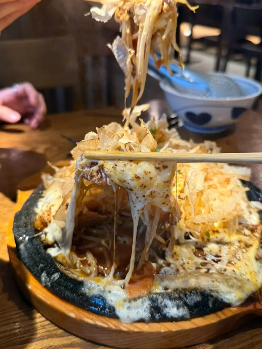 Generous portion of cheese okonomiyaki