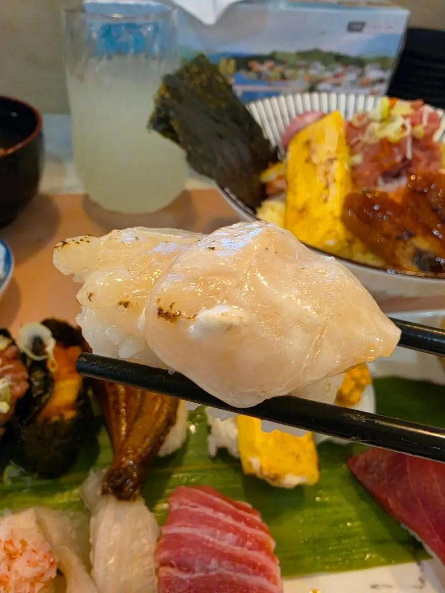 Scallop sushi brushed with sauce