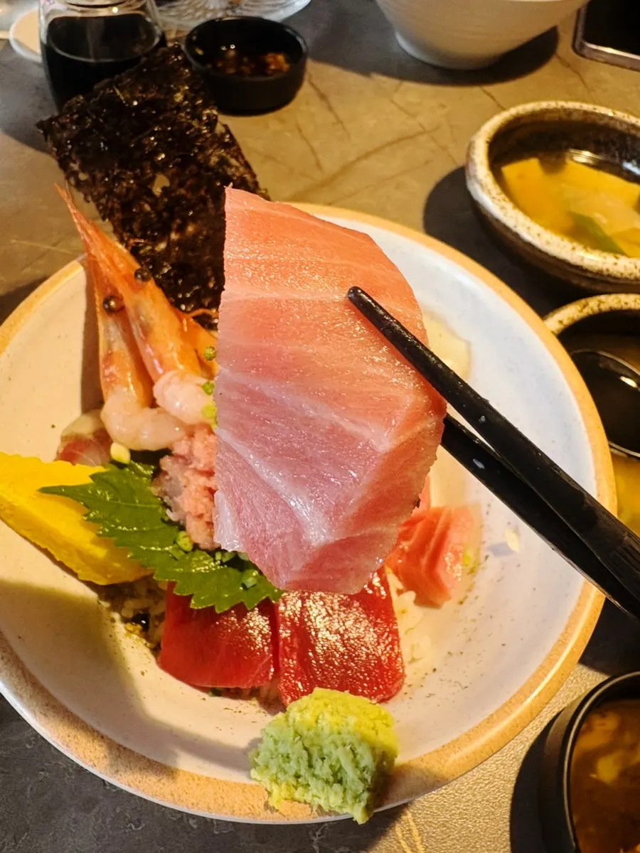 Close-up of a piece of seasonal fish sashimi