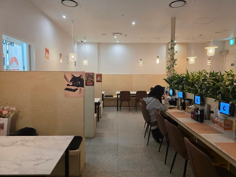Storefront entrance and menu board at Choe Uyeong Sushiya Jongno Branch