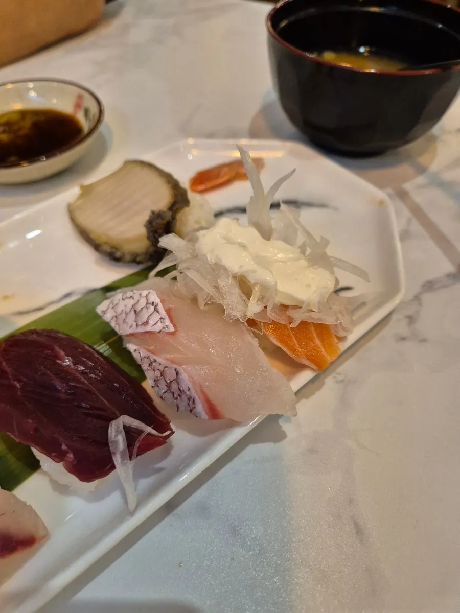 Sushi showing the thickness of fish covering the rice