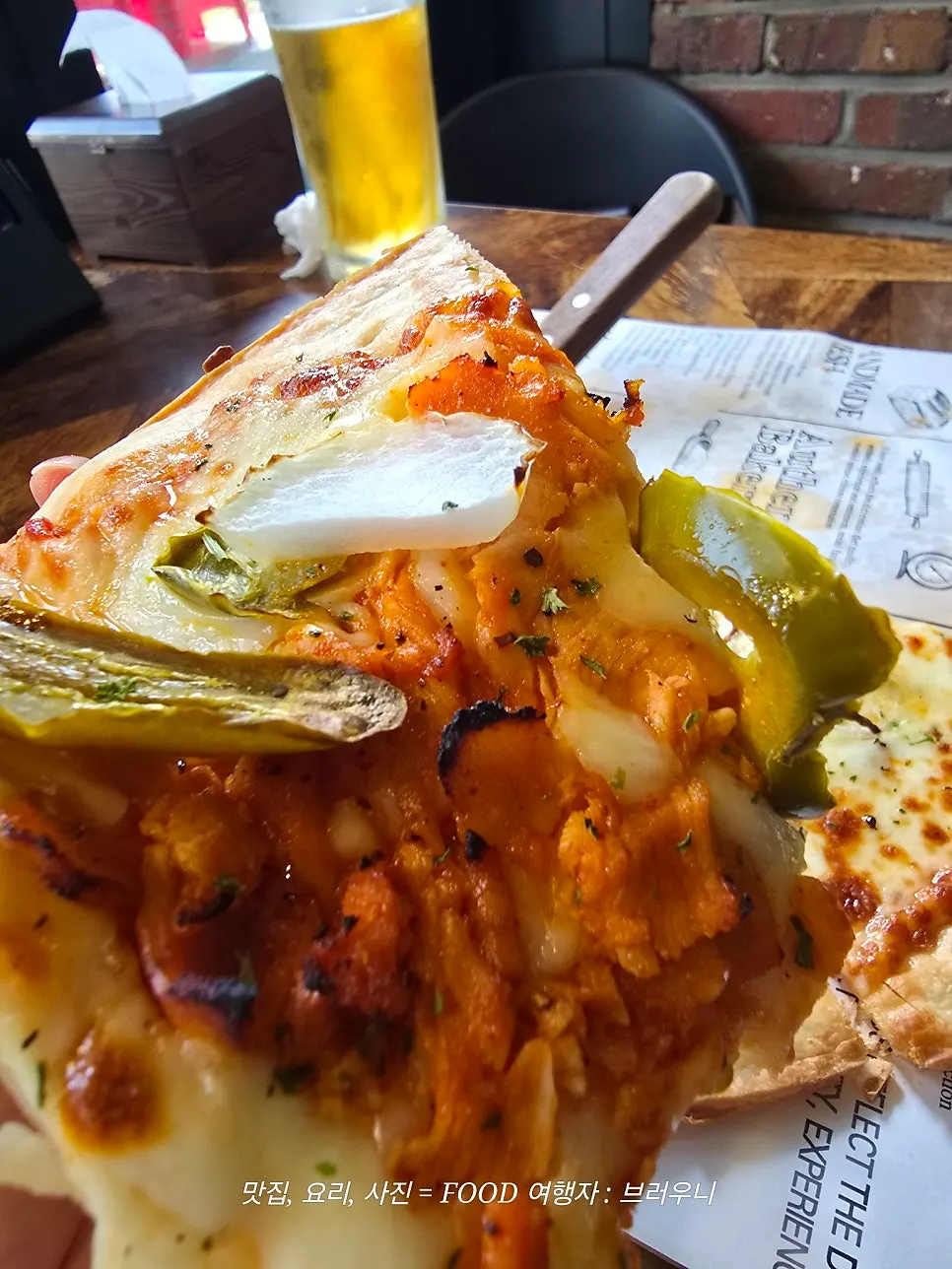 Hawaiian pizza and a piece of thin crust