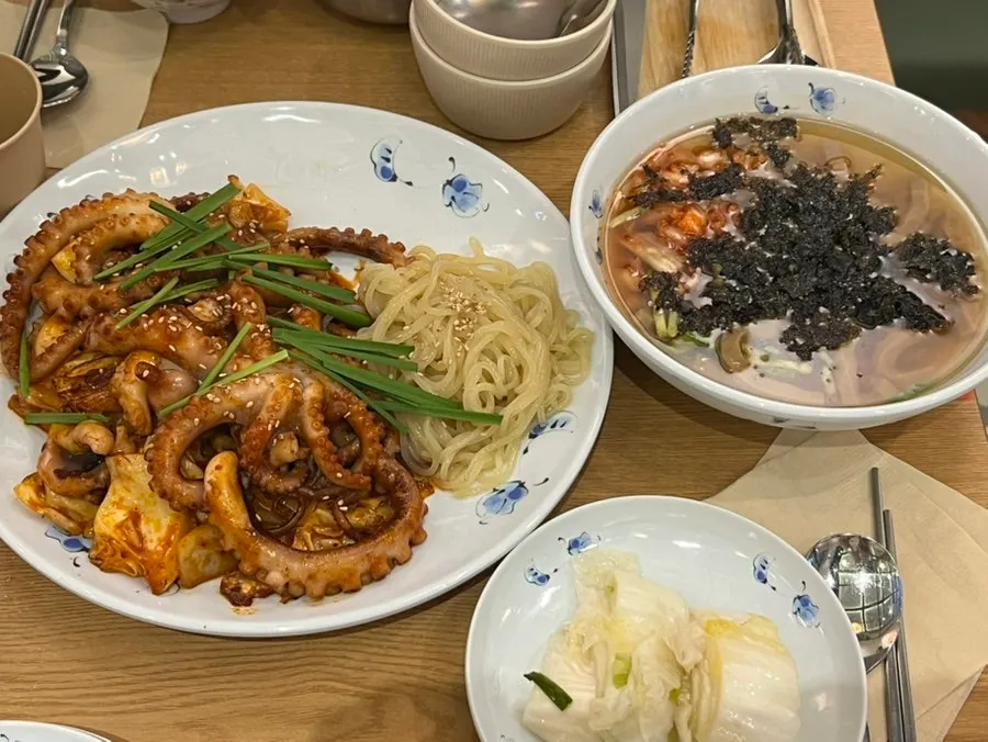 Cool mukbap and white kimchi served alongside