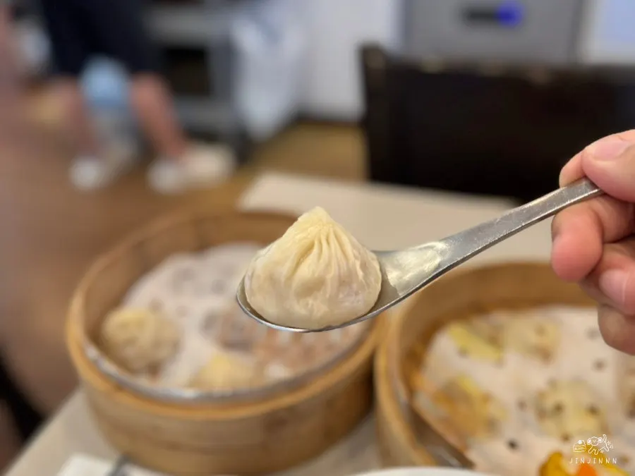 Xiaolongbao served with shredded ginger