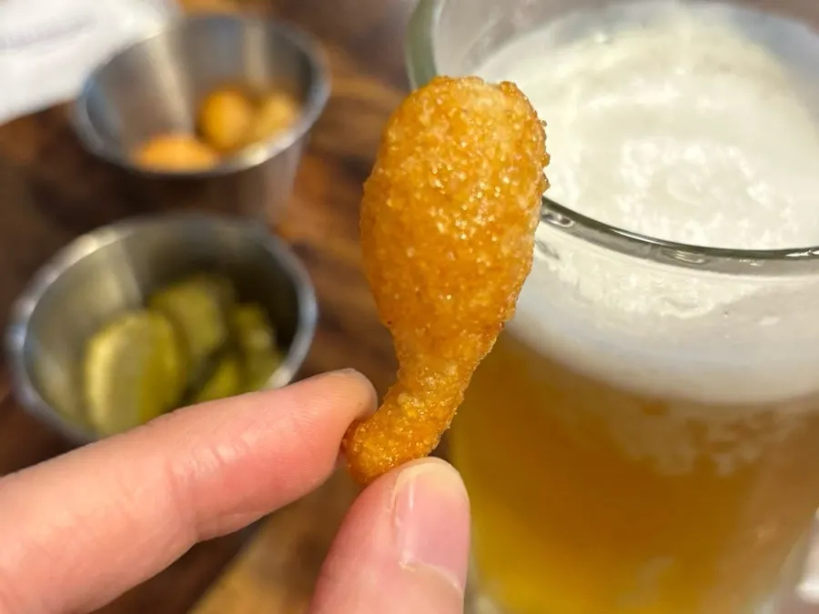 Terra draft beer with a generous foam head