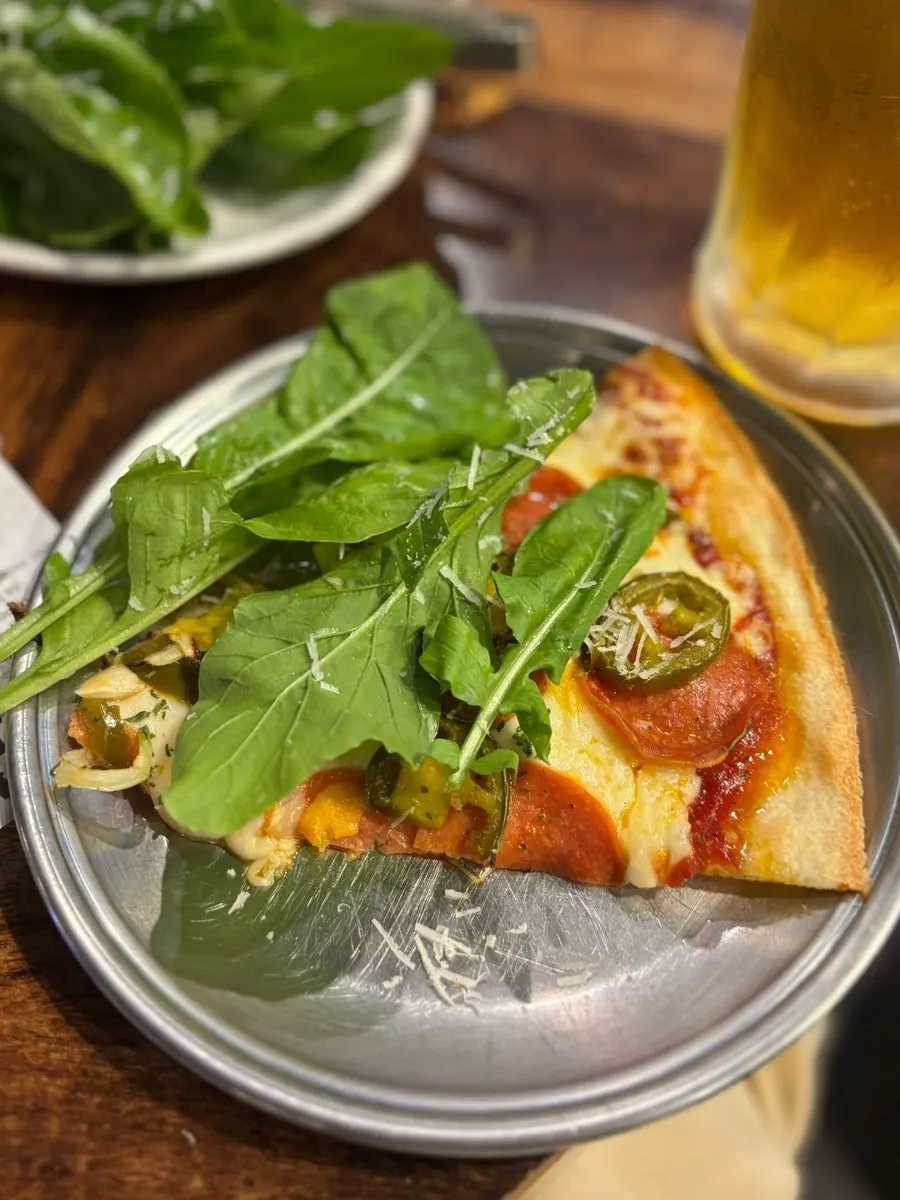Extra arugula to have with the pizza