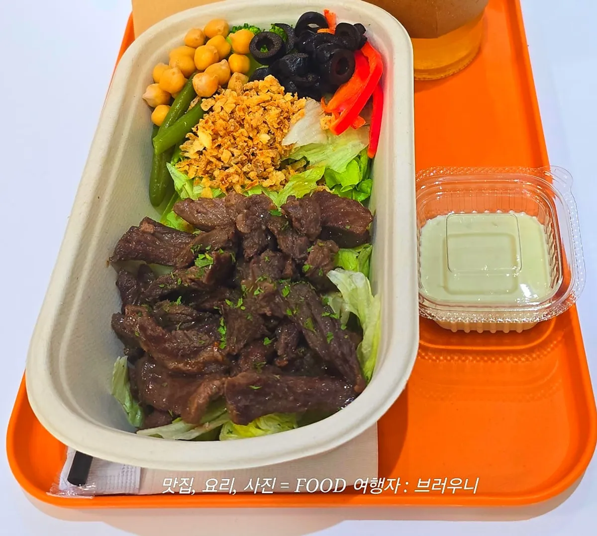 Beef Light Protein Box topped with sous vide beef steak