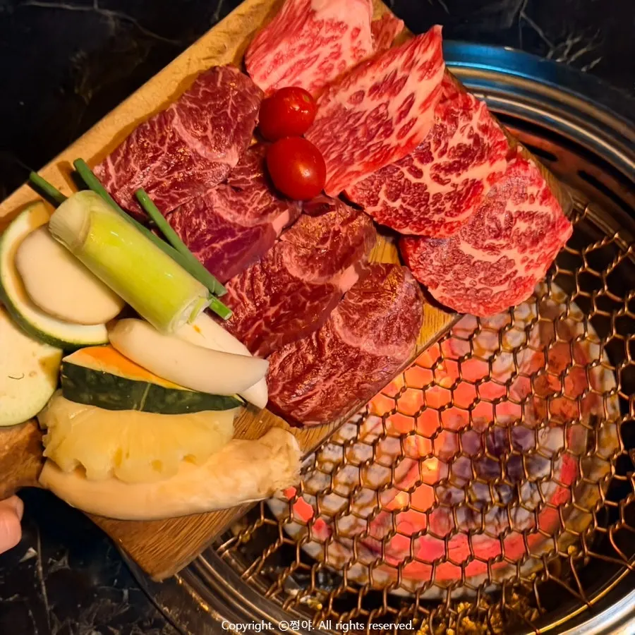 Full spread of beef and wine at Yukrab Jongno