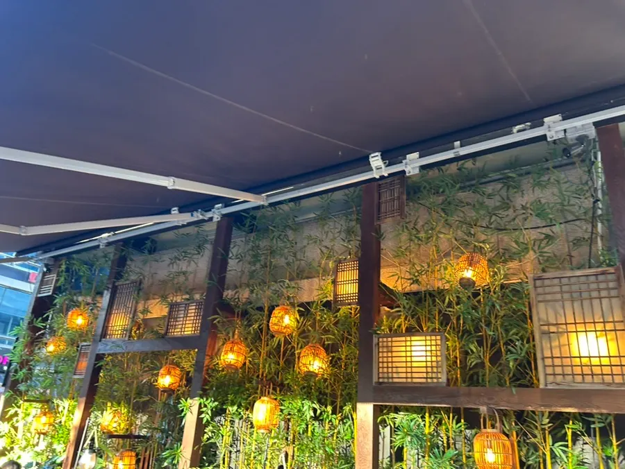 Outdoor tables packed with customers near Jongno 3-ga