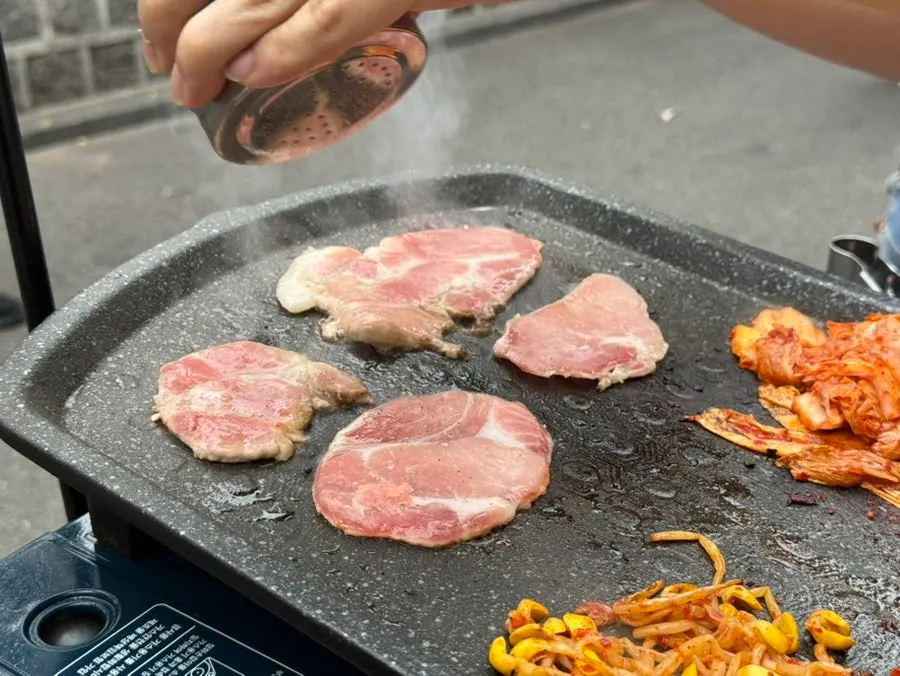 A grilled piece of pork belly