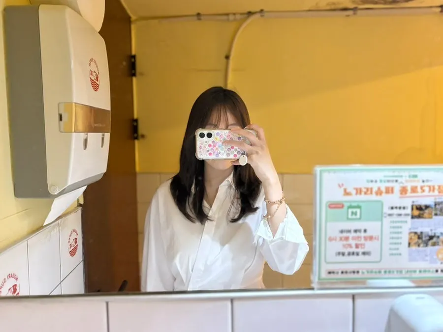 Separate men's and women's restrooms inside the bar