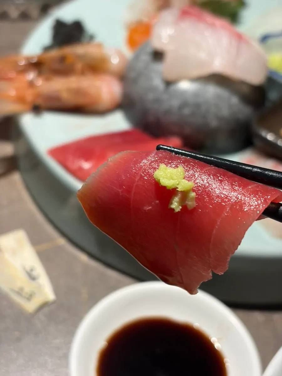 Sashimi topped with wasabi
