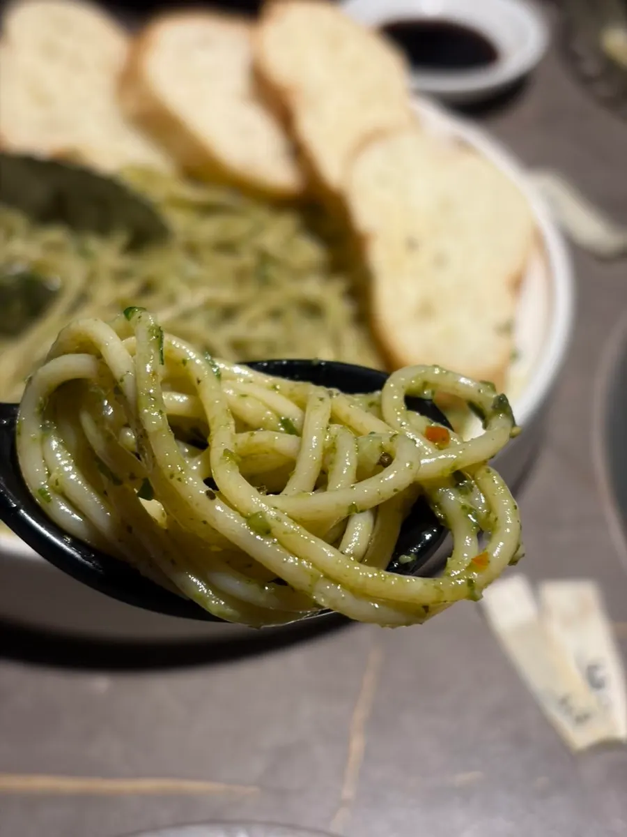 A plate of sweet shrimp basil pasta