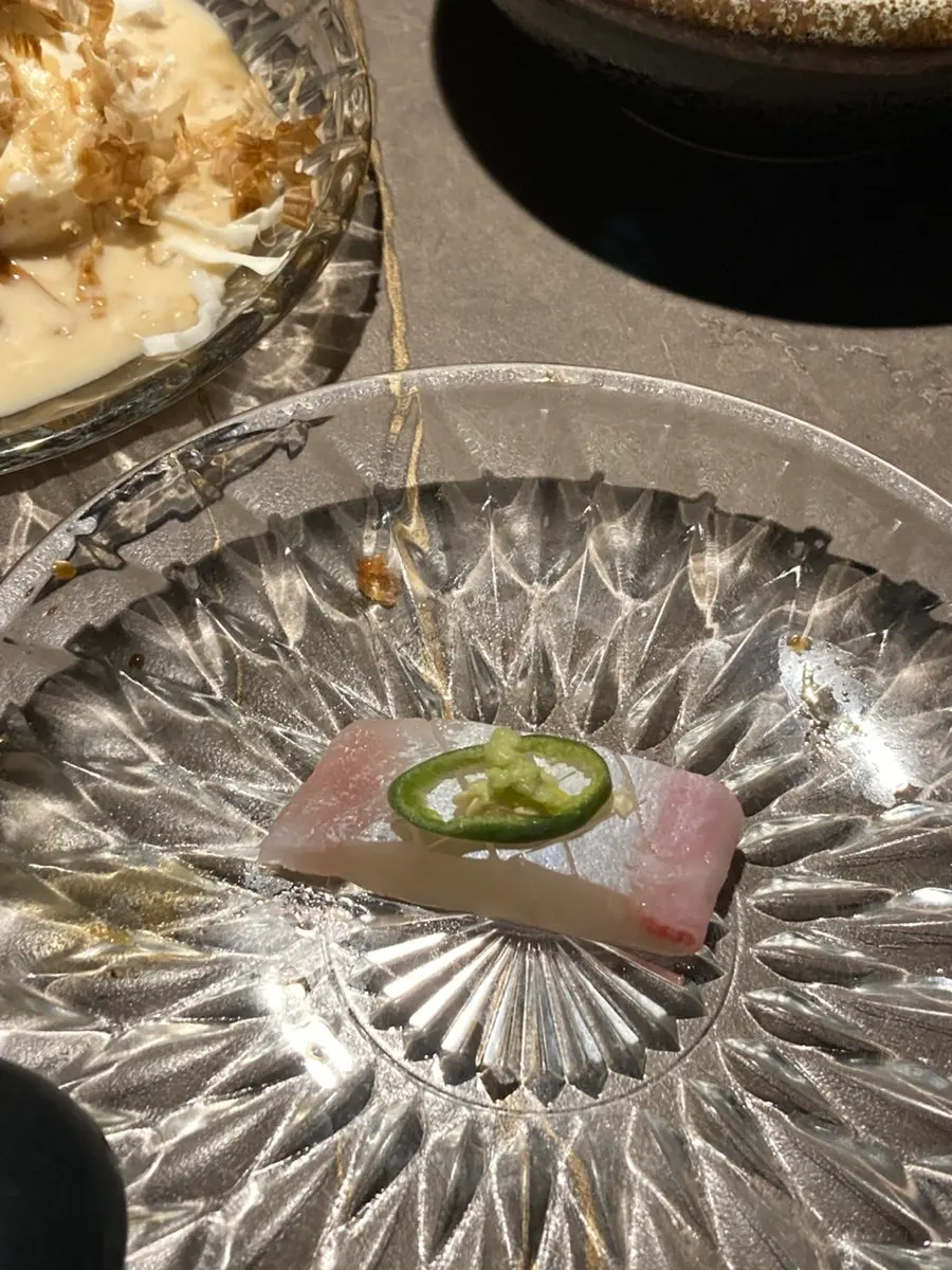 Close-up of the glossy aged sashimi plate