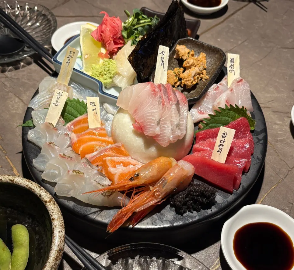 Assorted aged sashimi plate with name tags