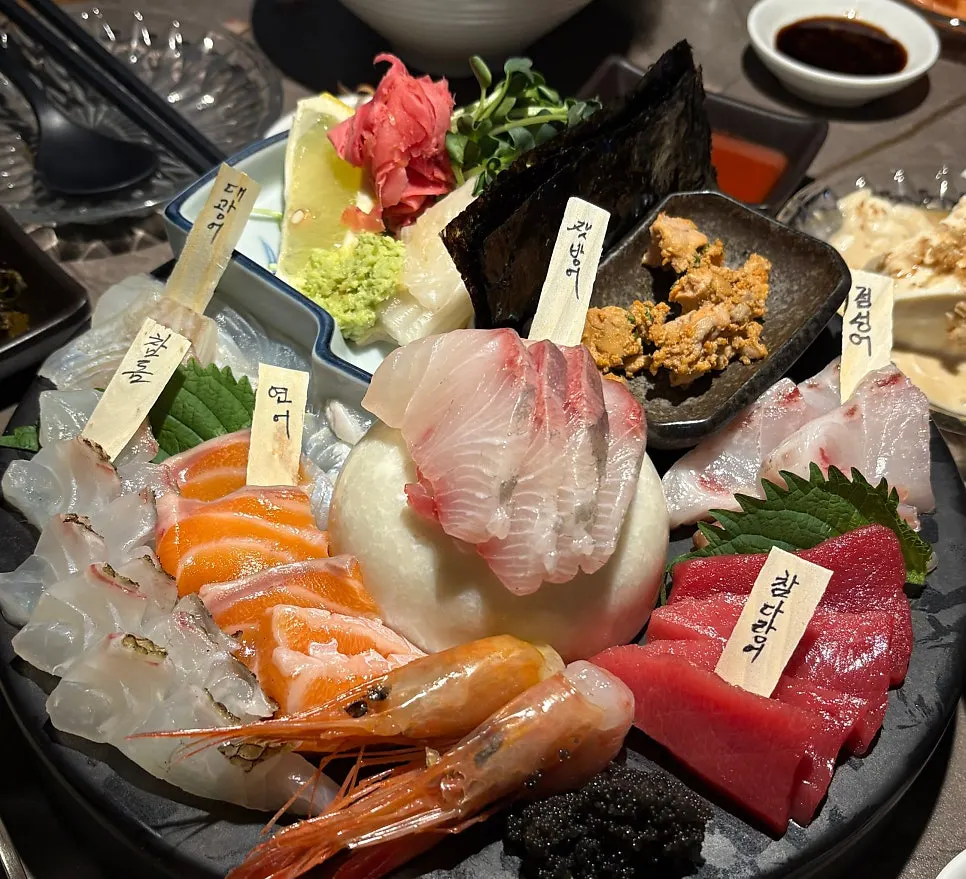 Plate with several types of aged sashimi