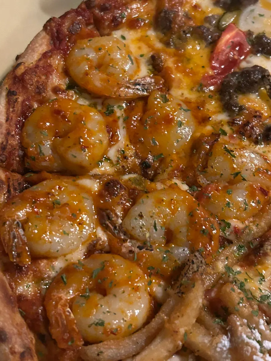 네 가지 맛으로 나뉜 쿼터스트리트 피자