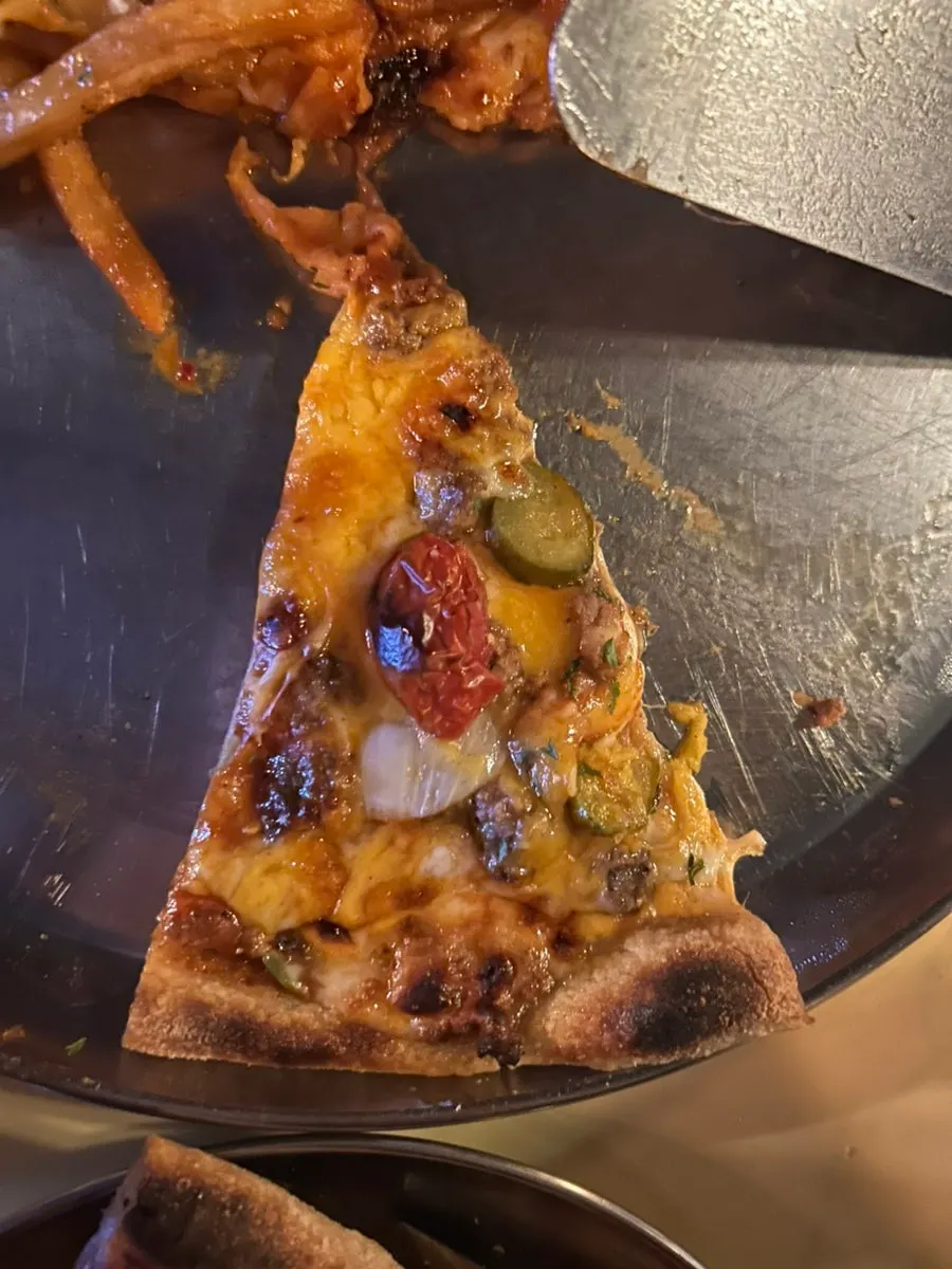 Slice of Cheese & Patty Bomb showing the patty topping