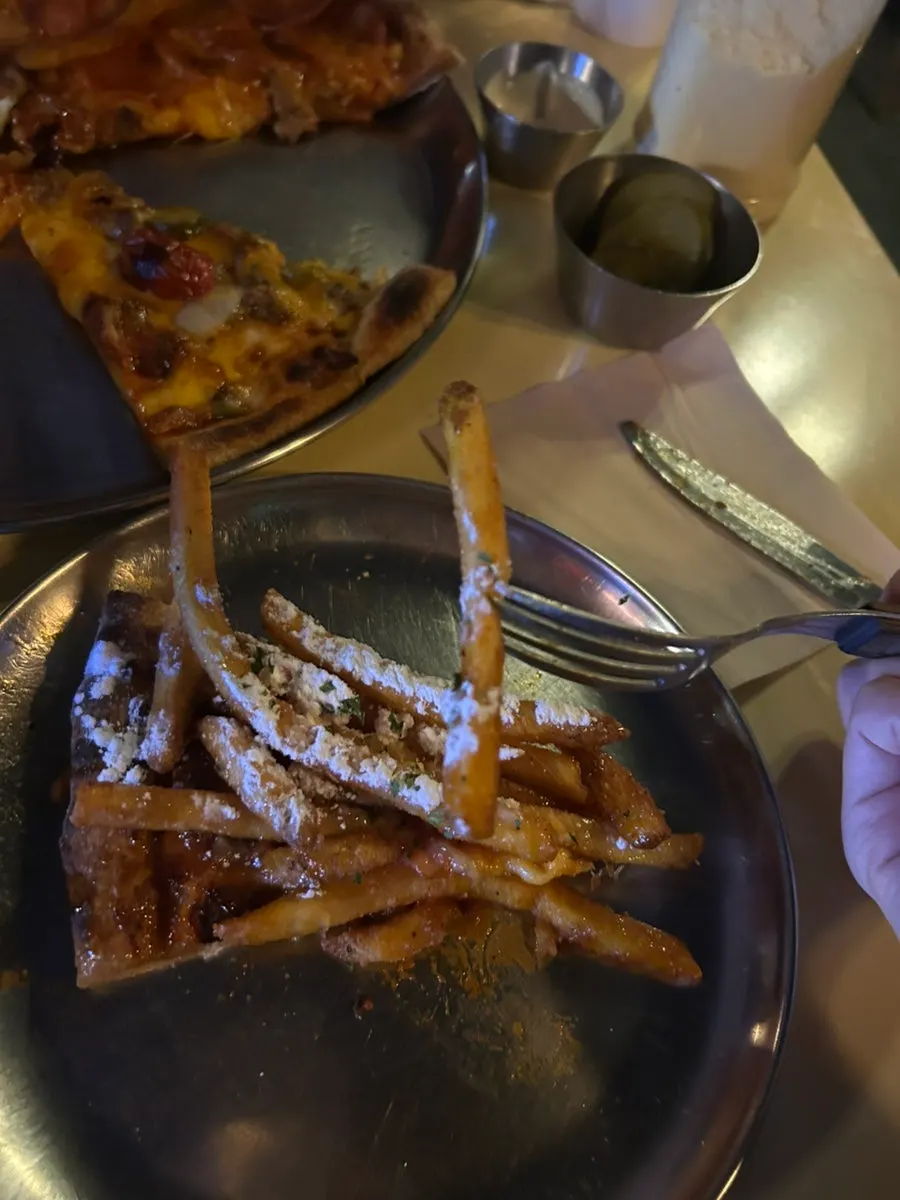 Potato Killer pizza topped with french fries