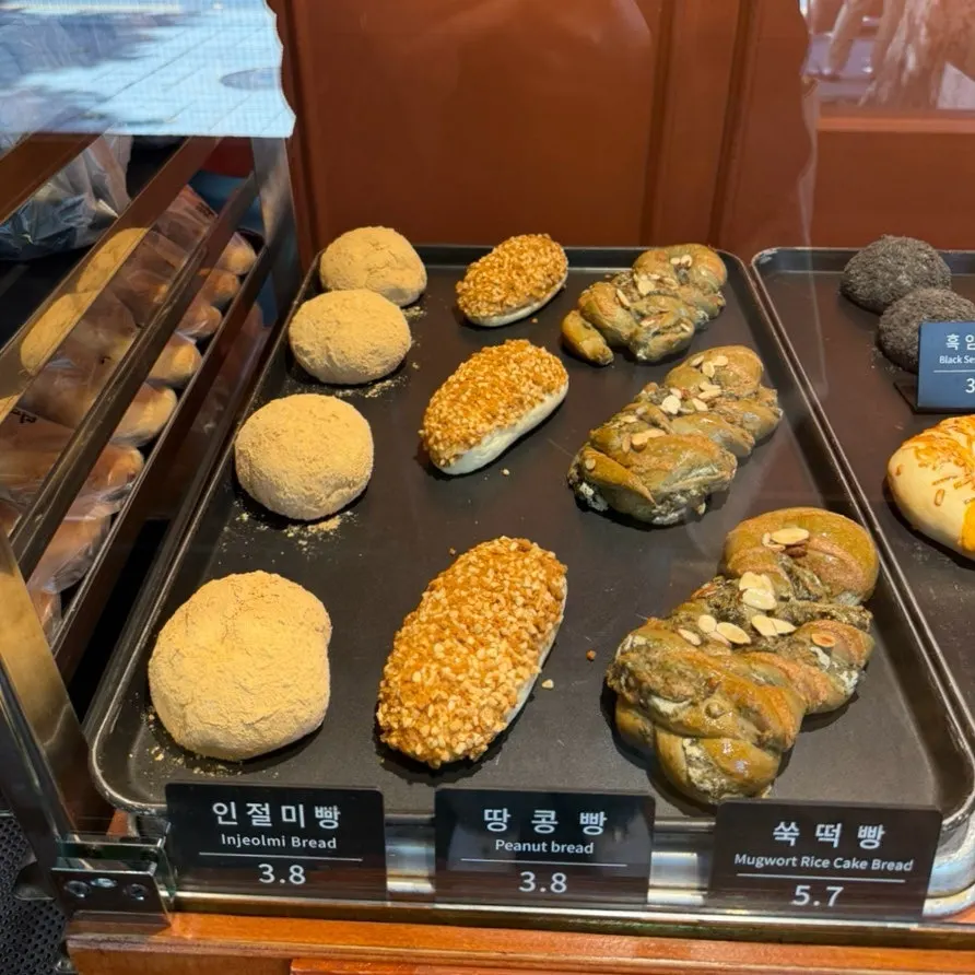 Garlic bread and rice loaves displayed at Munhwa Bakery