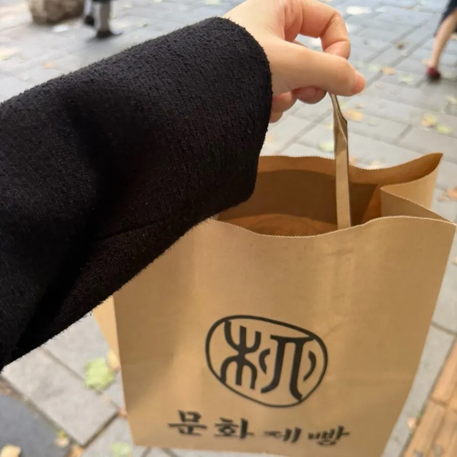 Three individually wrapped breads from Munhwa Bakery
