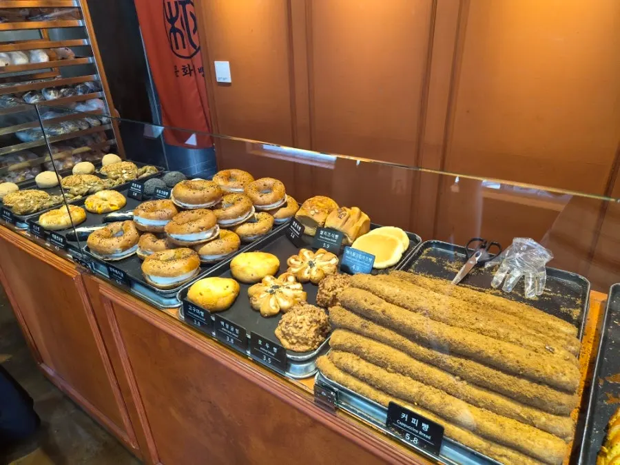 Display case with a wide variety of breads
