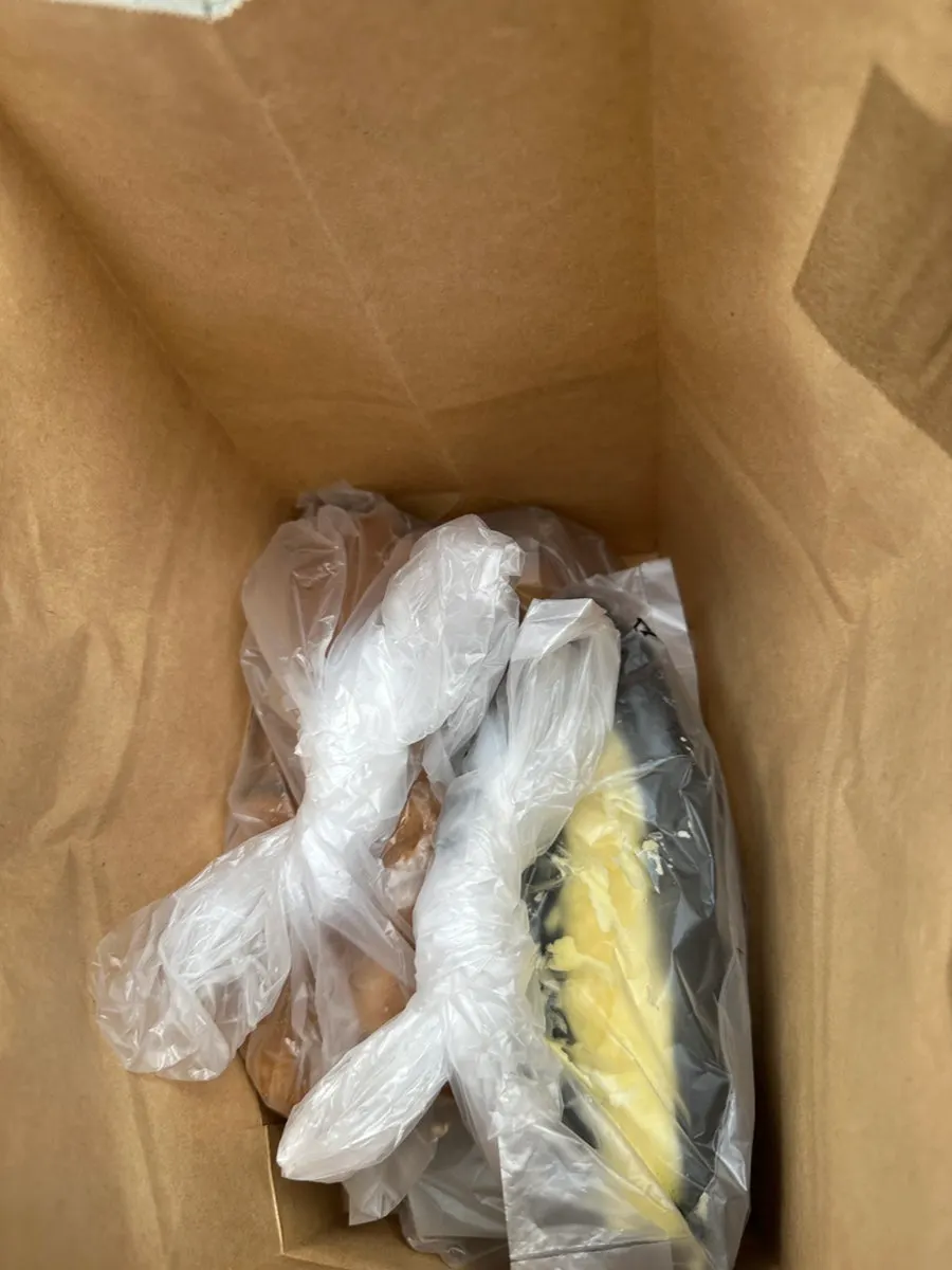 Bread packed in a paper shopping bag as a gift