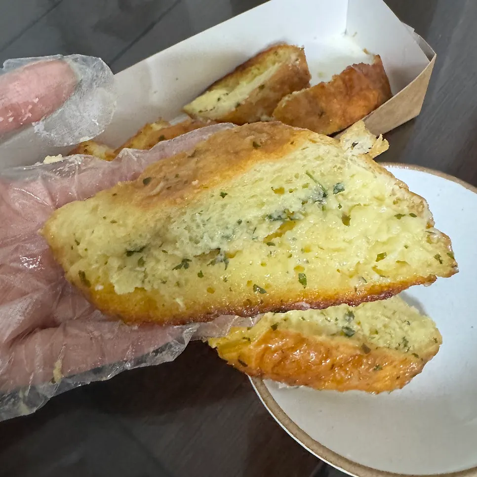 Garlic bread and onion bagel purchase