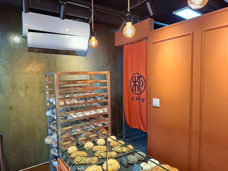 Bread display near the checkout counter at Munhwa Bakery
